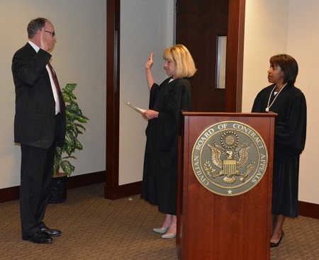 Judge Lester takes the oath from Chief Judge Prost