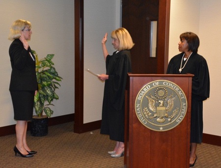 Judge Sullivan takes the oath from Chief Judge Prost